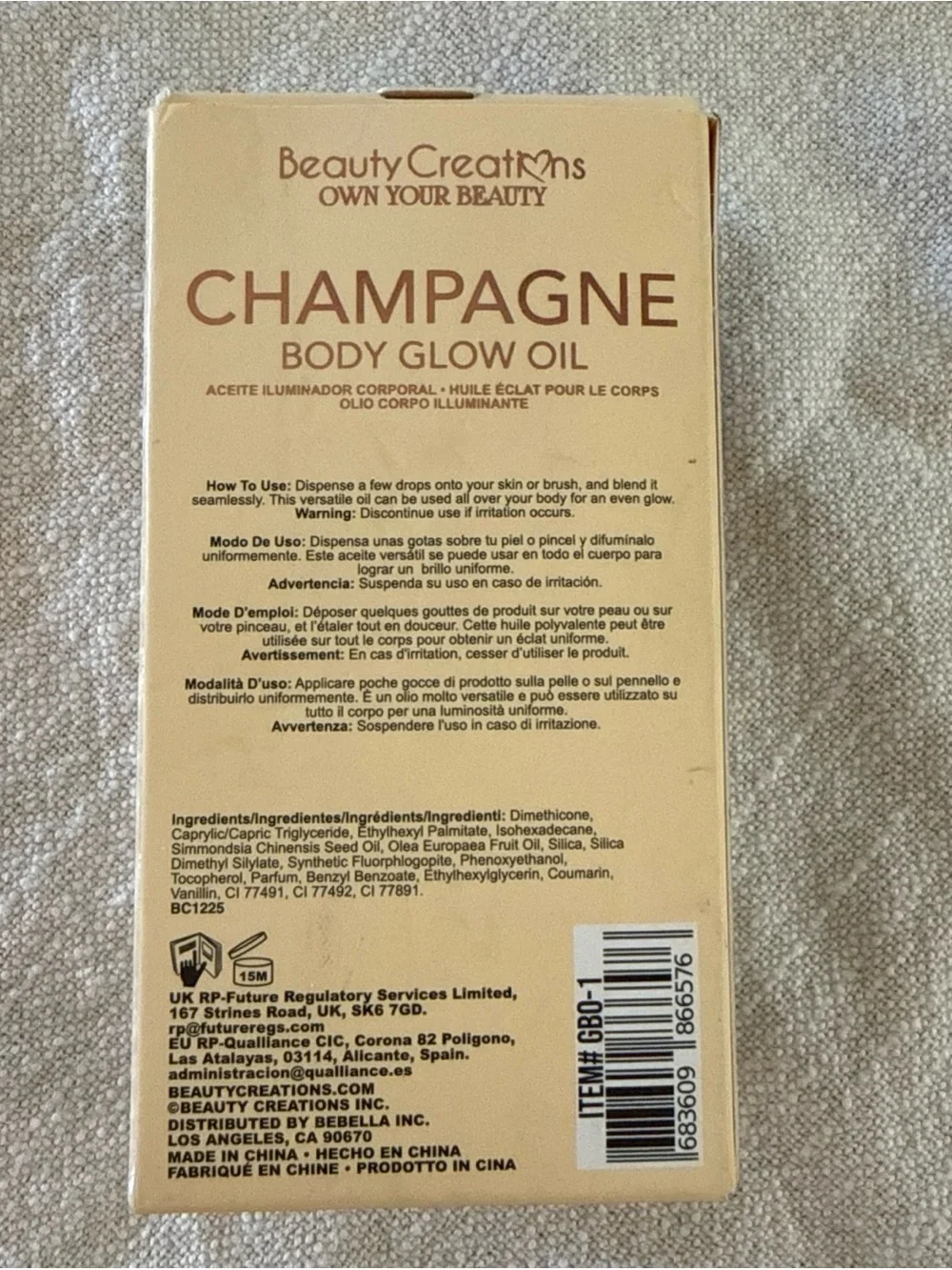 Beauty Creations Champagne Body Glow Oil - Shimmering Gold Bottle